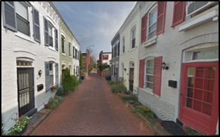 Google Street View of rowhomes fronting an alleyway in DC