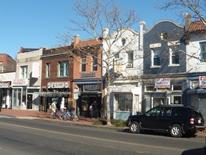 Image of Mt. Pleasant - Ward 1 street scene: rowhouses and storefronts Mt. Pleasant - Ward 1 street scene